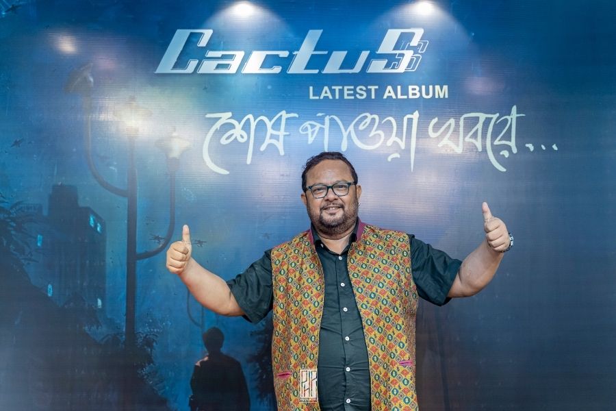 Frontman and vocalist Siddhartha 'Sidhu' Ray shows the cover art of the album designed by Niloy Das