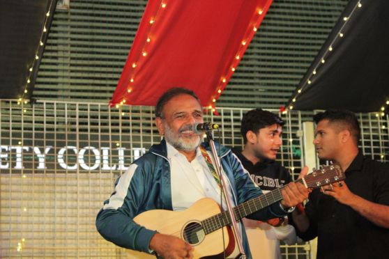 Professor Dilip Shah, Rector and Dean of Student Affairs performing in the Carnival.