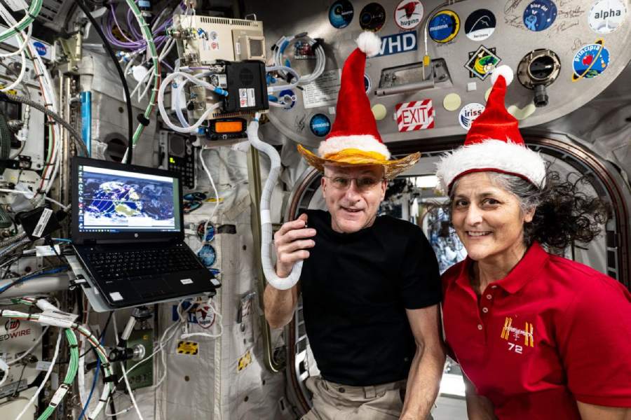 A post on X by Nasa's Johnson Space Center shows astronauts Don Pettit and Sunita Williams posing for a fun holiday season portrait while speaking on a ham radio inside the space station's Columbus laboratory module.