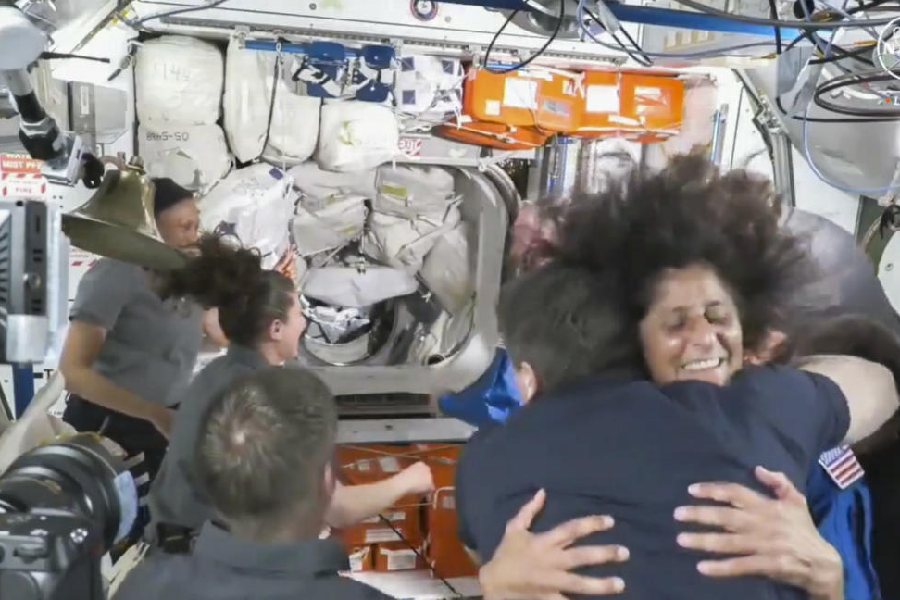 Williams can be seen hugging a colleague while entering the International Space Station.