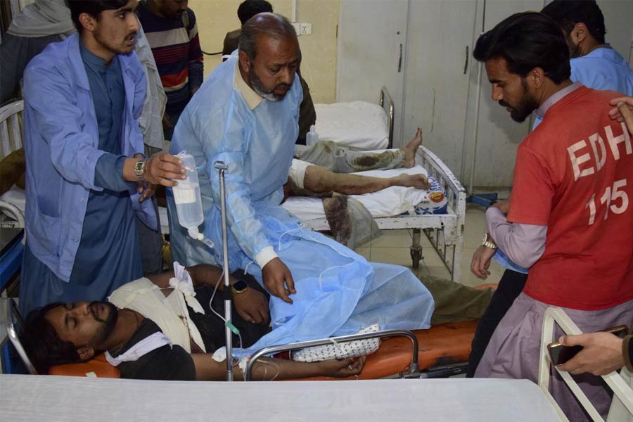 An injured victim of a passenger train attacked by insurgents, receives treatment upon arrival at a hospital in Quetta, Pakistan's southwestern Balochistan province, Thursday March 13, 2025.