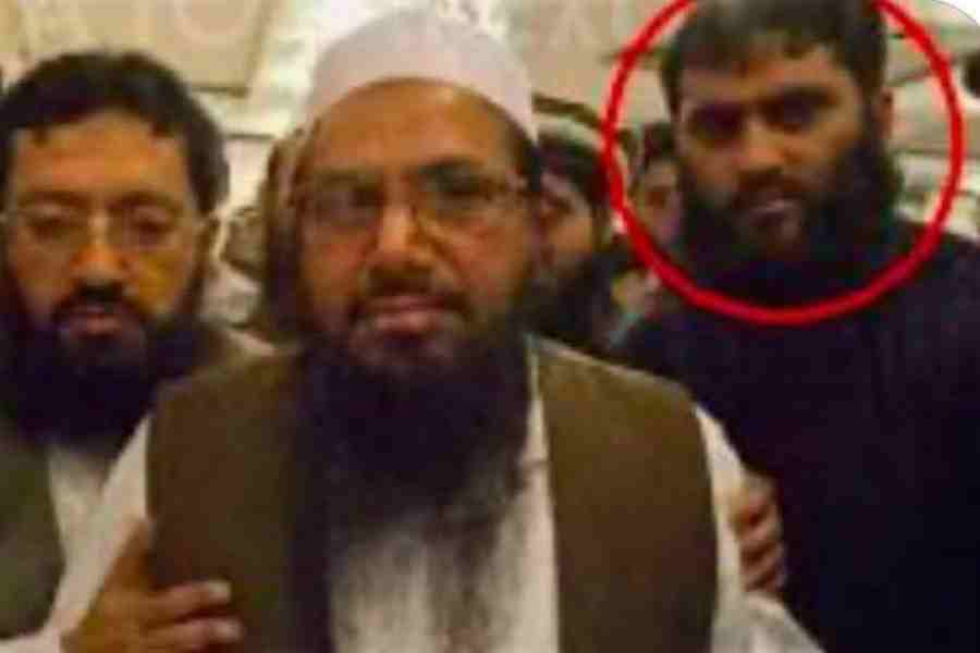 A photograph of Abu Qatal (circled in red) with Hafiz Saeed doing the rounds on social media.
