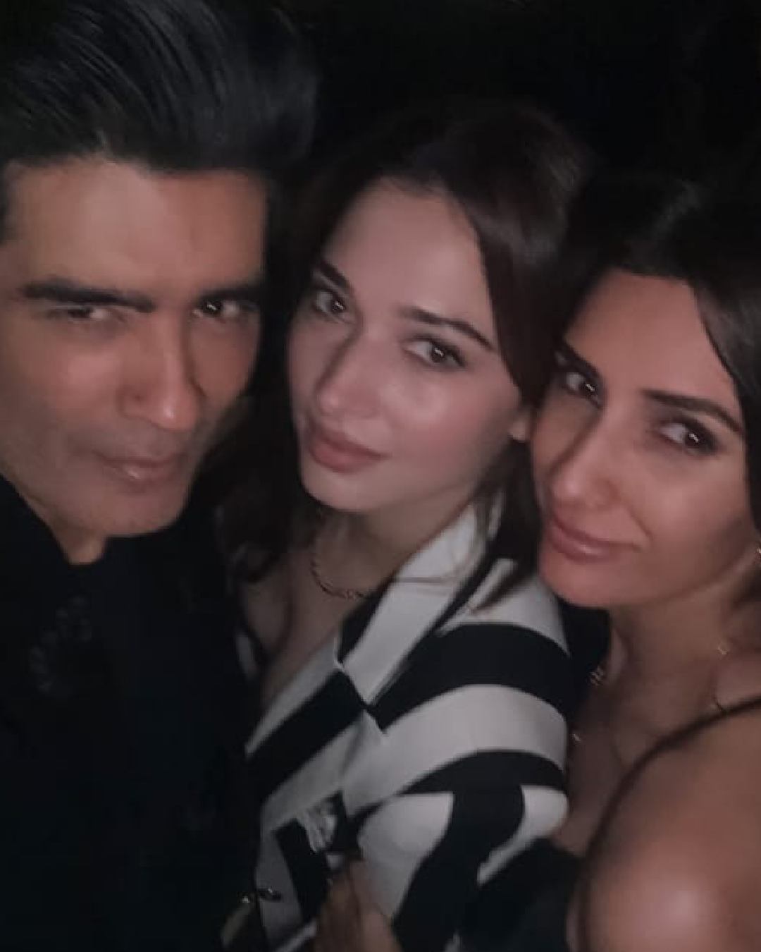 Clad in a sleeveless black dress, Pragya posed for a selfie with Manish and Tamannaah at Rasha’s birthday party.  
