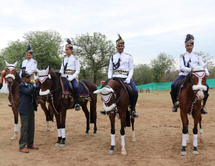The gold-winning team of A.K. Chatterjee (captain), sergeant D. Dhara, constable S. Mahapatra, and sepoy A. Chakraborty, along with horses Imprimatur, Rukmini, Bahulian, and Historian