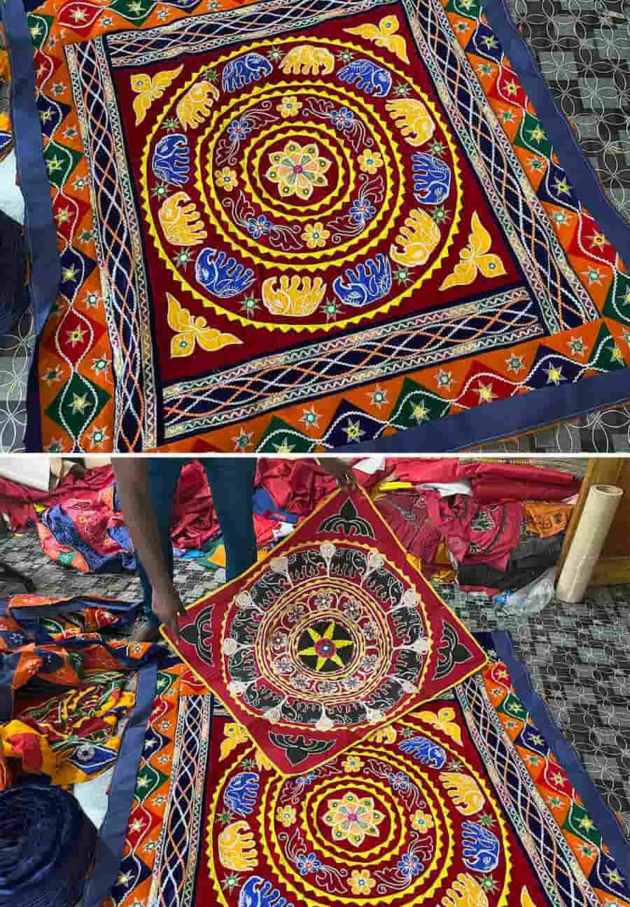 Chandua is a decorative and vibrant cloth initially used in temples. It is made by stitching several pieces of cloth together, creating intricate designs featuring religious motifs, animals, birds and flowers. During Rath Yatra, the cloth is used to cover the canopy of the raths