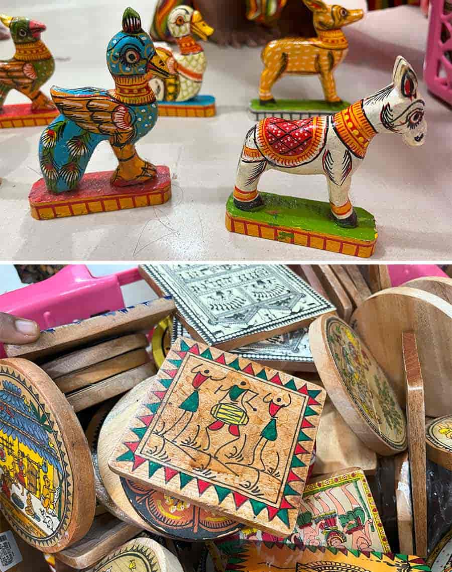 The shops also sell handcrafted wooden toys, tea coasters, wall hangings, showpieces and more. The artists cut, paint and polish the wooden items by hand. The prices for the toys and coasters start from Rs 100