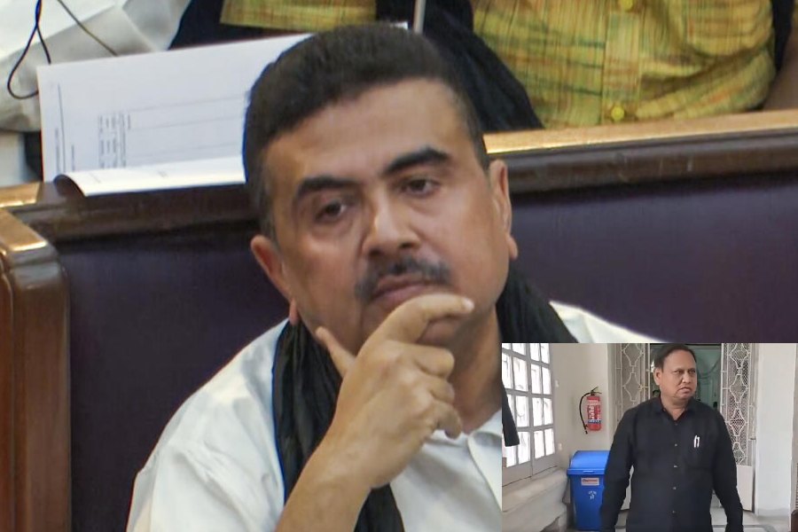 Humayun Kabir (left), Suvendu Adhikari (right)