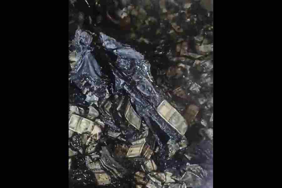 In this screengrab from a video released by the Supreme Court of India on Saturday, March 22, 2025, interior of a storeroom where cash was allegedly discovered during a firefighting operation at Delhi High Court judge Yashwant Varma’s house on the night of Holi, in New Delhi.