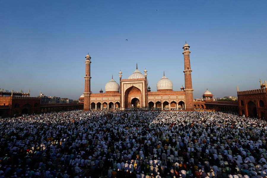 Muslims offer prayers at Jama Masjid on the occasion of Eid al-Fitr, in Delhi.