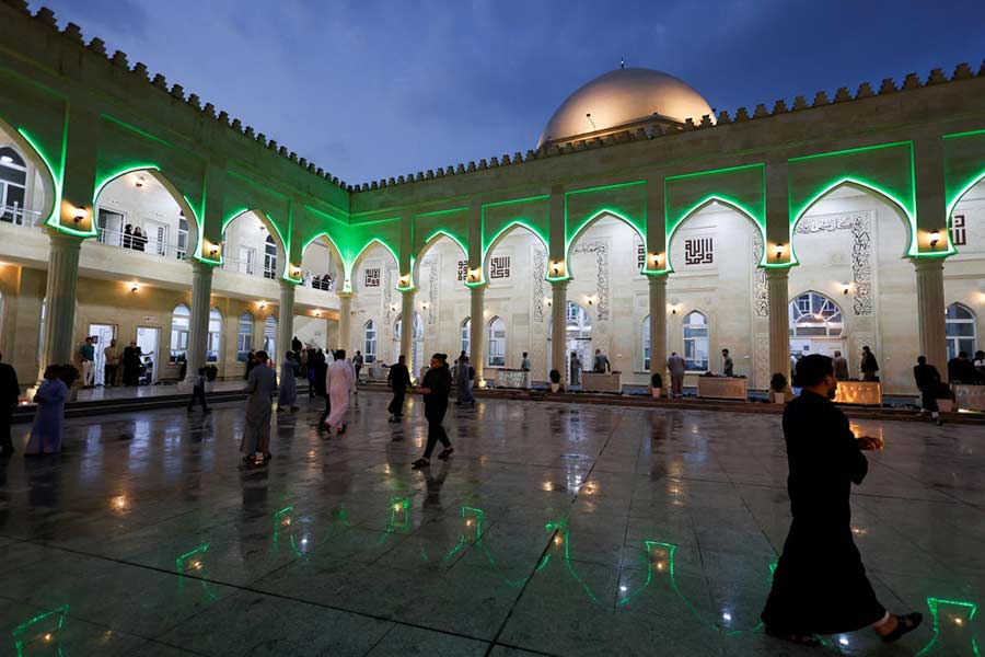 Sunni Muslims gather to attend Eid al-Fitr prayer marking the end of the holy fasting month of Ramadan in Mosul, Iraq.