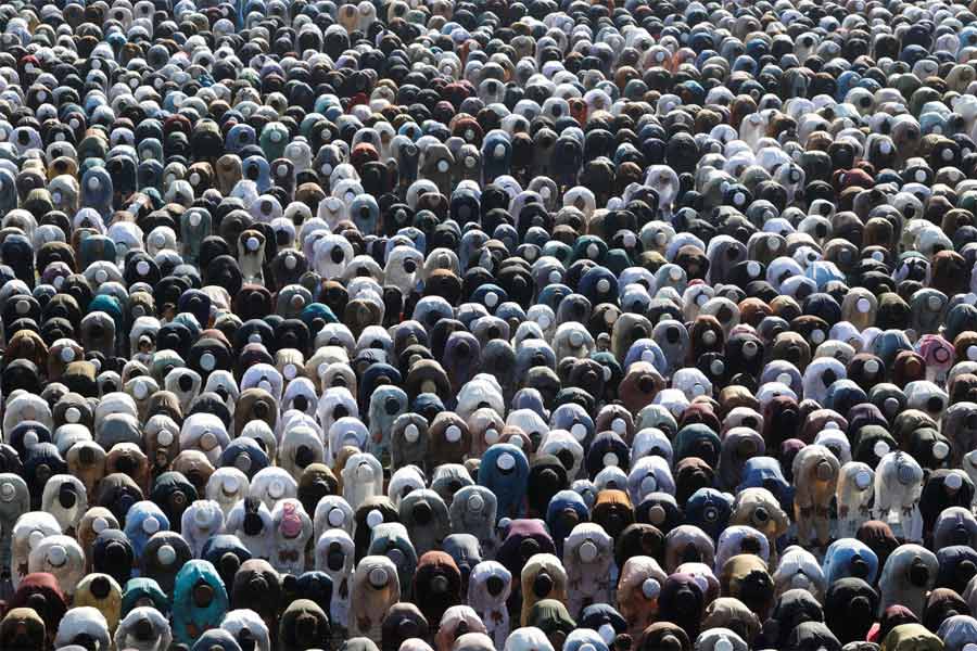 Muslims attend Eid al-Fitr prayers to mark the end of the holy month of Ramadan, in Karachi, Pakistan.