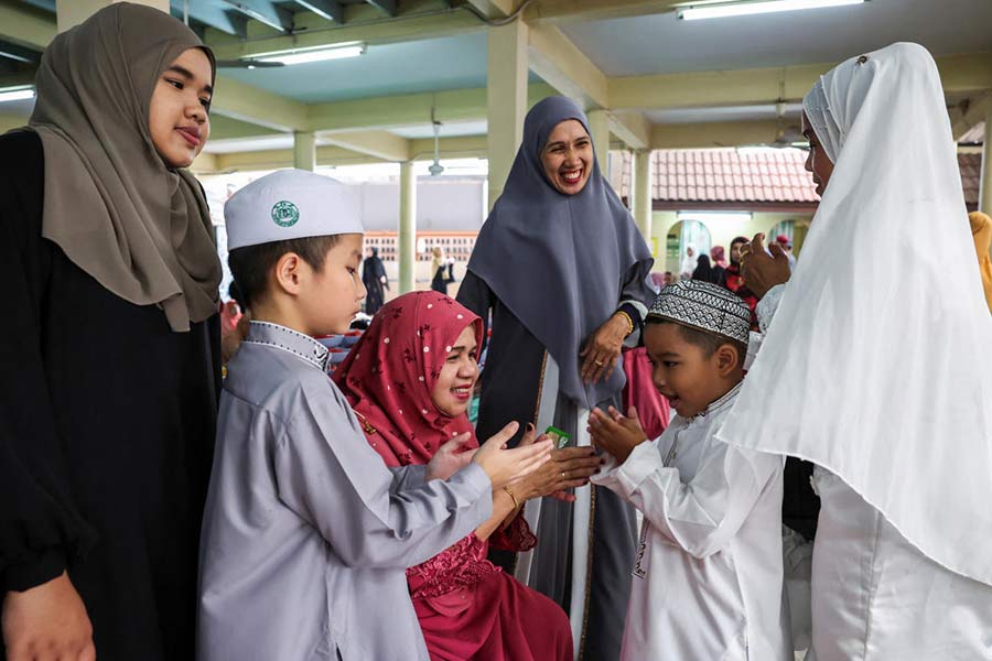 Muslims celebrate Eid with prayers in Bangkok.