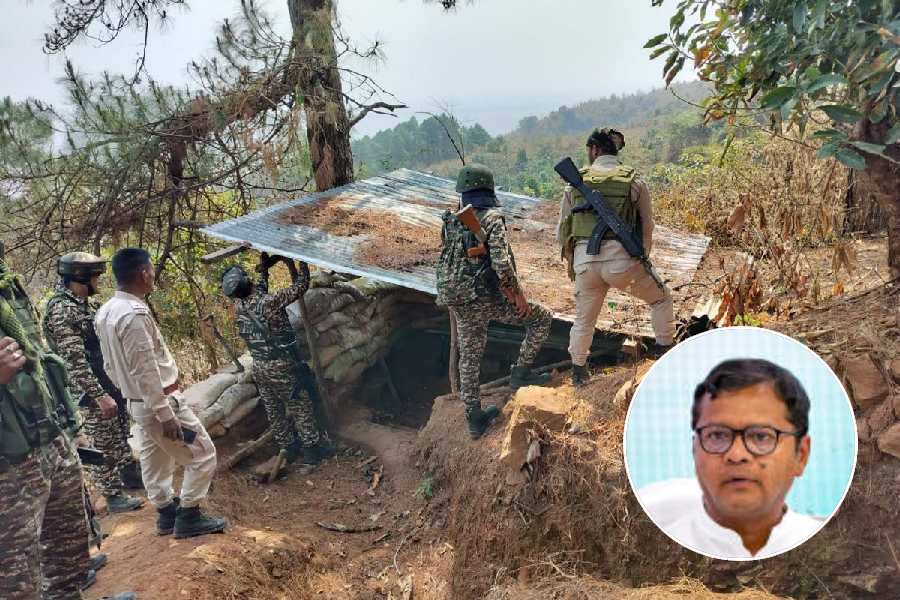 In this image released by @manipur_police via X on Monday, March 3, 2025, Security personnel dismantle illegal bunkers at Haraothel area under Leimakhong-PS, in Kangpokpi district of Manipur