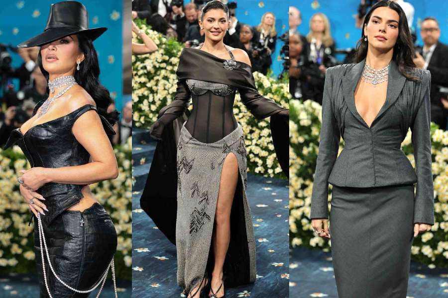 Kim Kardashian, Kendall Jenner and Kylie Jenner walked the red carpet for fashion’s biggest night in shades of black and grey. 