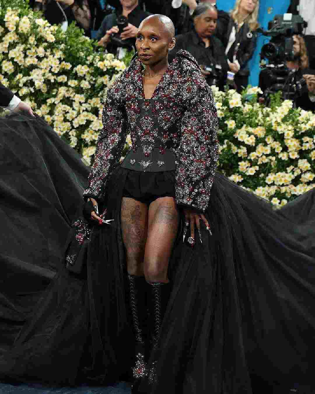 Wicked star Cynthia Erivo wore a stunning Givenchy beaded corset top and a black tulle skirt with a floor-grazing train. 