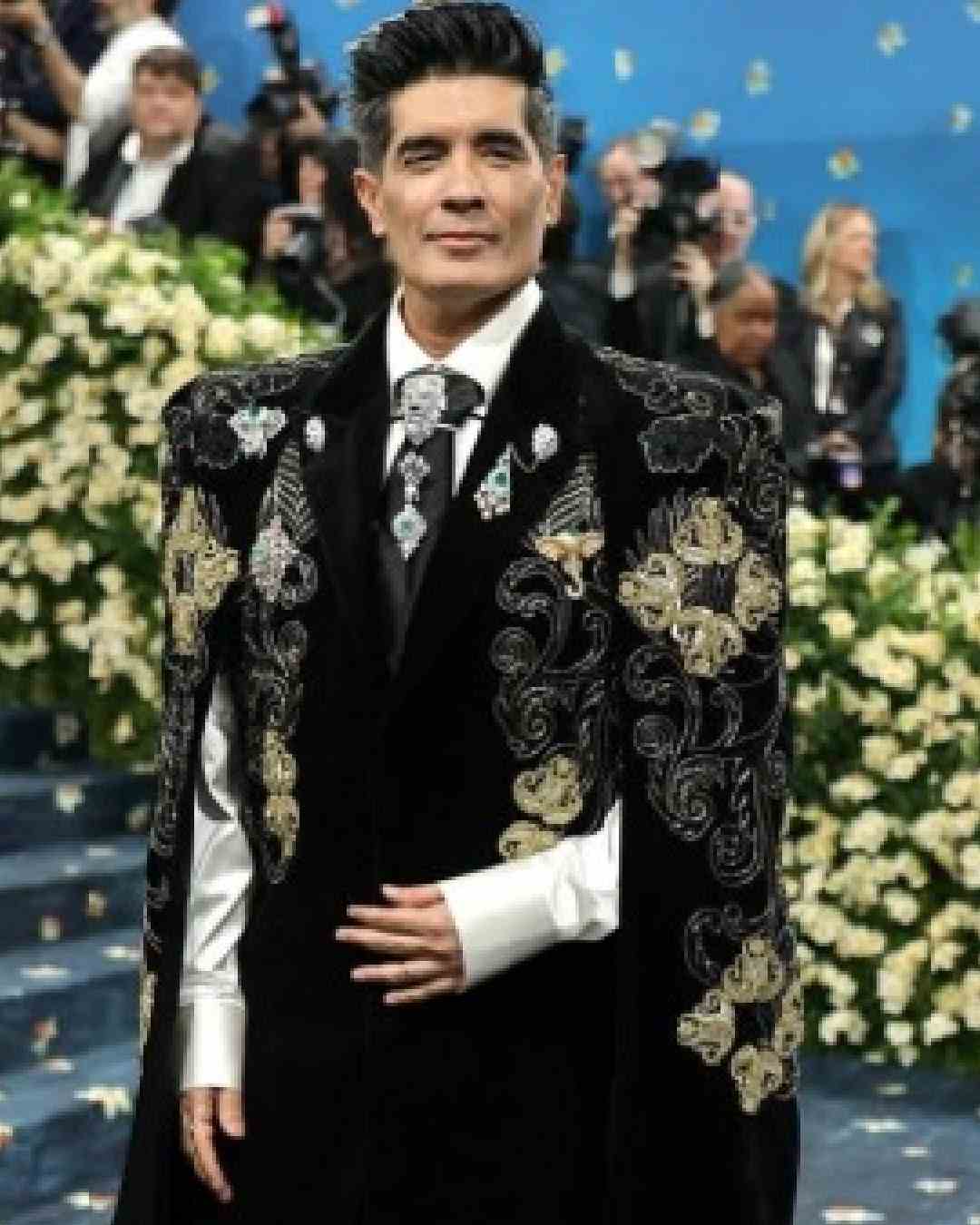 Couturier-producer Manish Malhotra made a majestic Met gala debut in a black blazer encrusted with crystals, emeralds and bejewelled brooches.