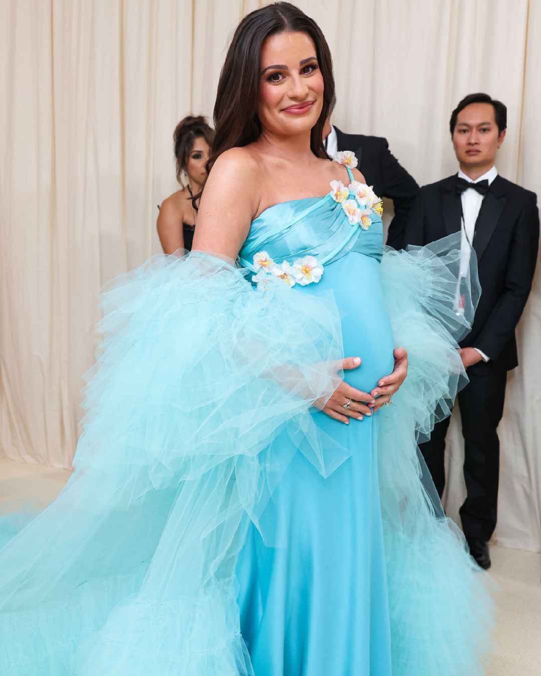 Actress-singer Lea Michele flaunted her baby bump at the 2024 Met Gala in a blue Rodarte gown.