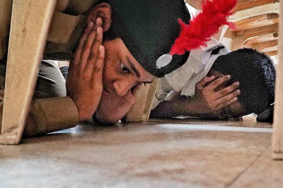 At Delhi Public School, students hid under chairs as sounds of sirens echoed.