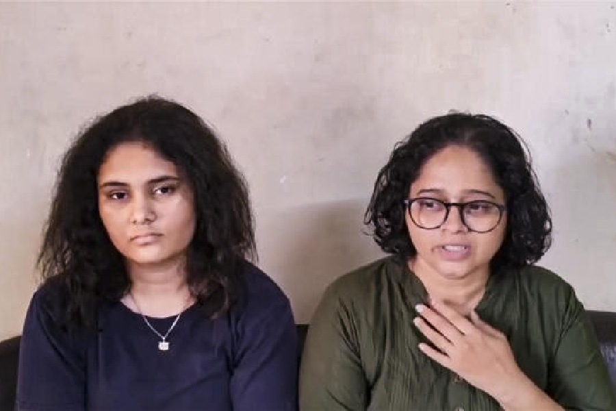 Richa and Anushka Mone, daughter and wife of Pahalgam attack victim Atul Mone, speak to reporters in Thane on Wednesday
