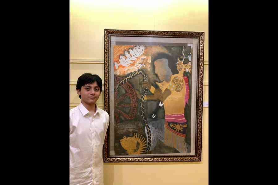 Ahil with his painting, Karna