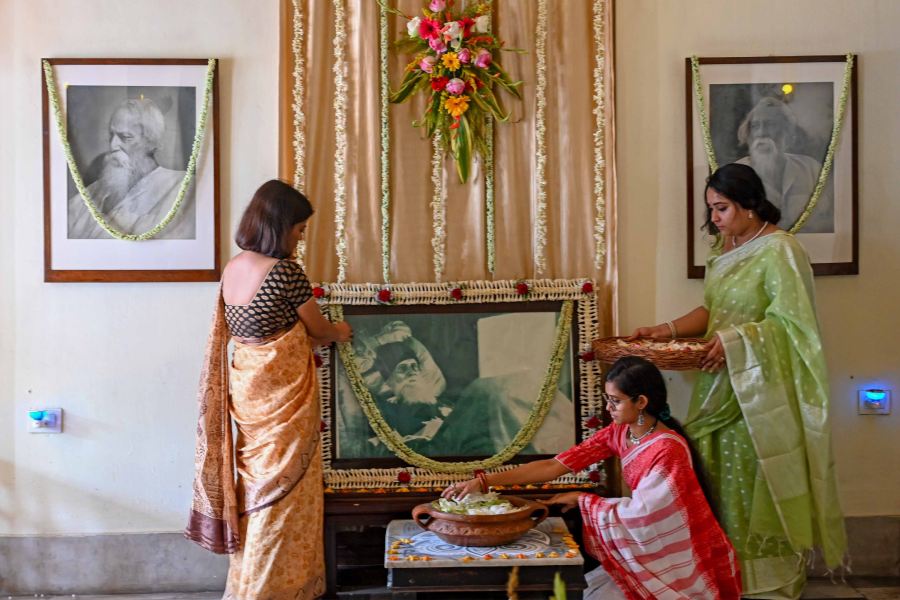 Photographs of the bard are garlanded in Jorasanko Thakurbari 