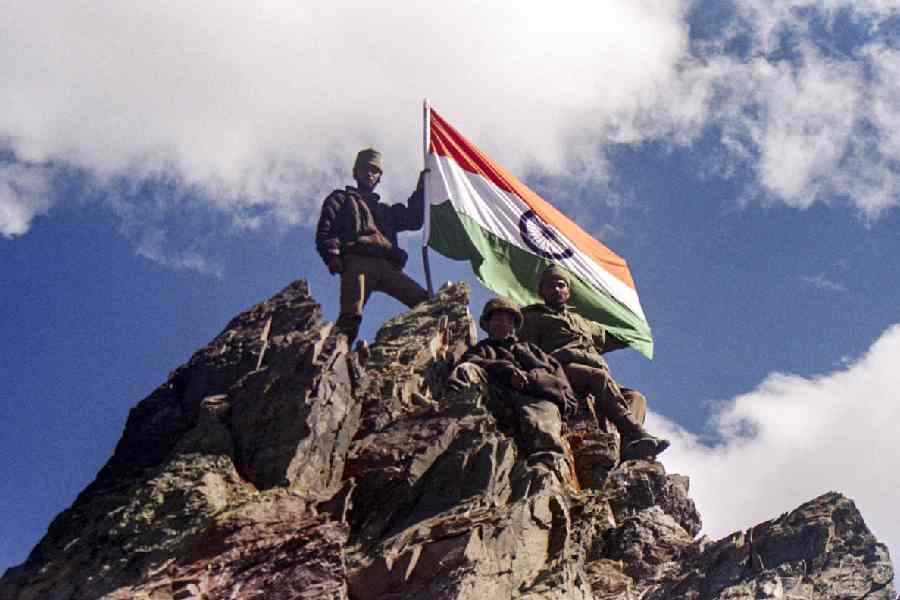 In this photo from PTI archives, Indian army soldiers are seen at Tiger Hill in the Drass-Kargil area of Ladakh.