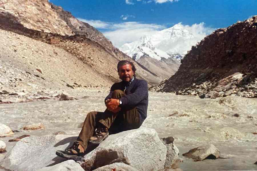 Sergio Scapagnini in front of the north face of Mt. Everest, seen from the Tibetan range, close to the base camp on July 1 1994 during the shooting of Beyond the Himalayas