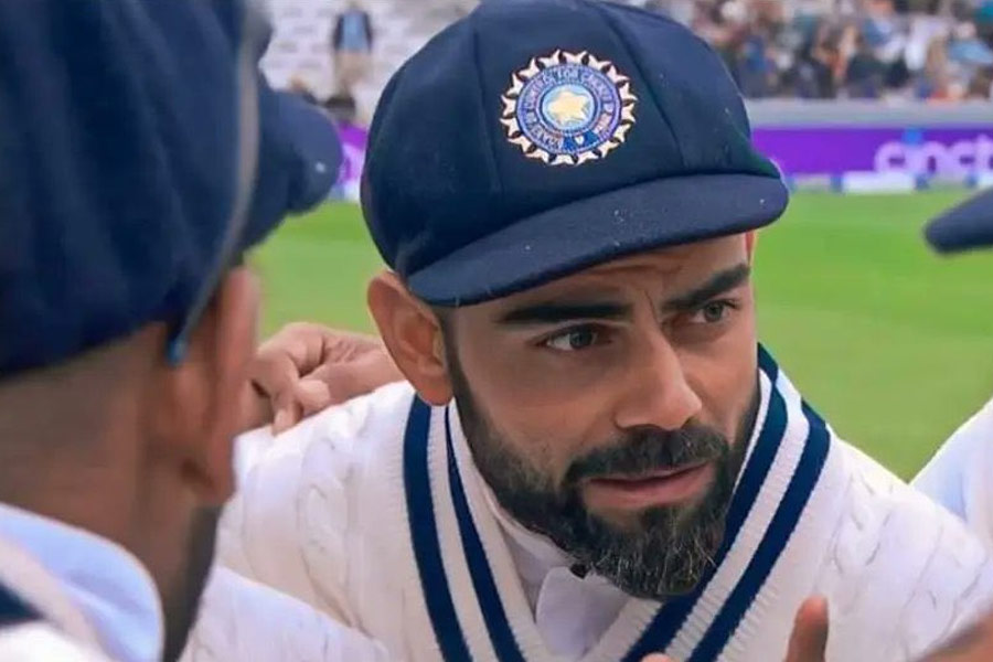 In this Sunday, March 12, 2023 file image, cricketer Virat Kohli celebrates after scoring a century during a test cricket match against Australia at Narendra Modi Stadium, in Ahmedabad. Kohli on Monday announced his retirement from Test cricket.