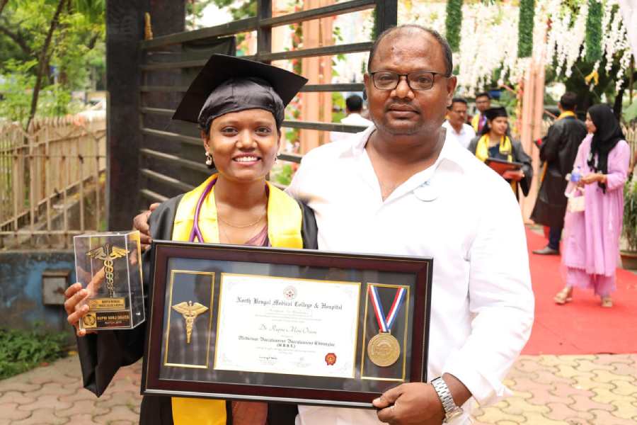 Rupni Minz Oraon and her father Raghu Oraon.