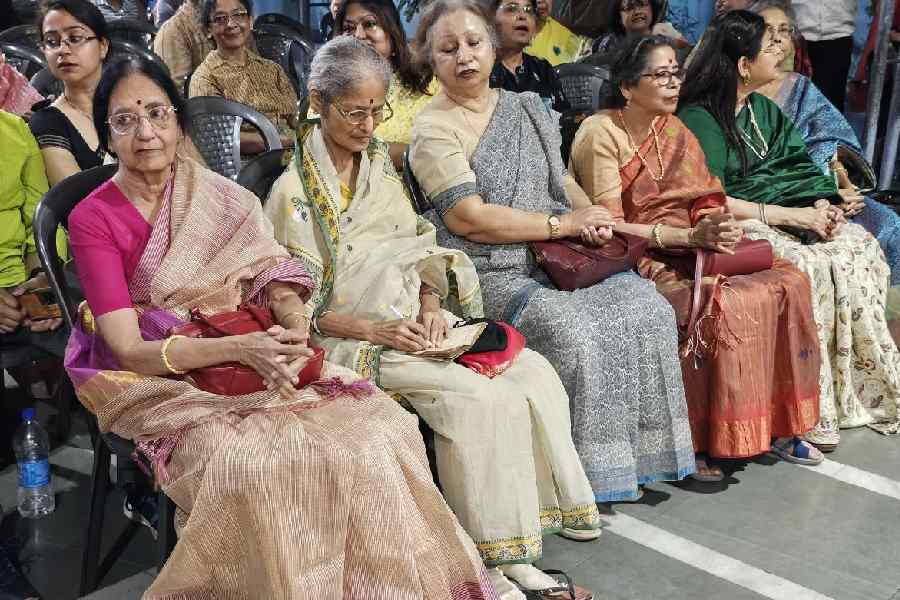 Retired teachers watch the programme