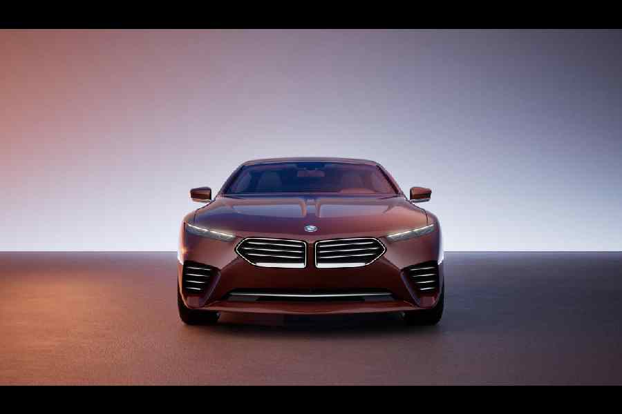 The front end has a V-line and a shark nose highlighted by sleek headlamps and an illuminated grille