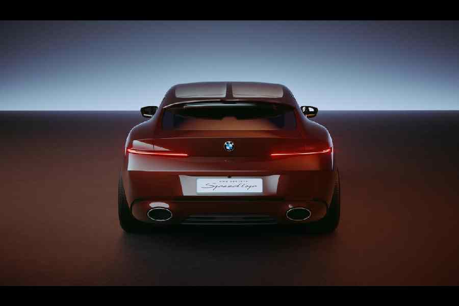 The rear end clearly has a BMW look although everything is sleeker. There is a distinctive two-tone treatment to the roof as well