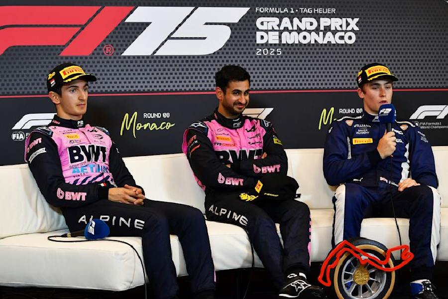 Kush Maini (centre) during a press conference post race along with Gabriele Mini (left) and Luke Browning (right)