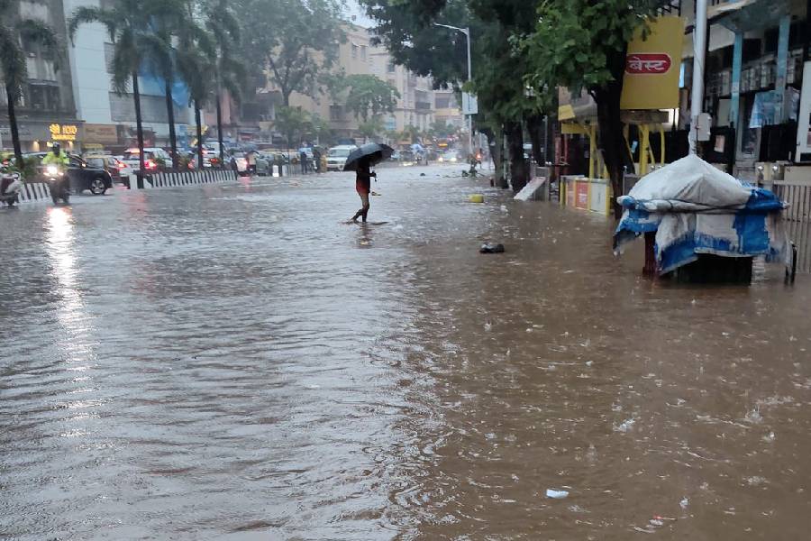 Mumbai street lies flooded after heavy rains, disrupting traffic and daily life