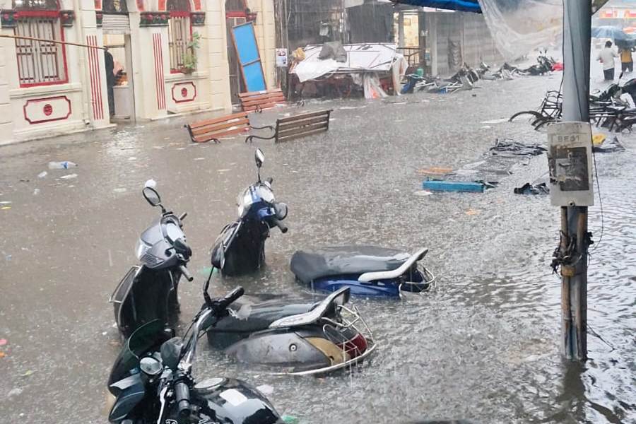 Two-wheelers submerged in knee-deep water as Mumbai streets flood