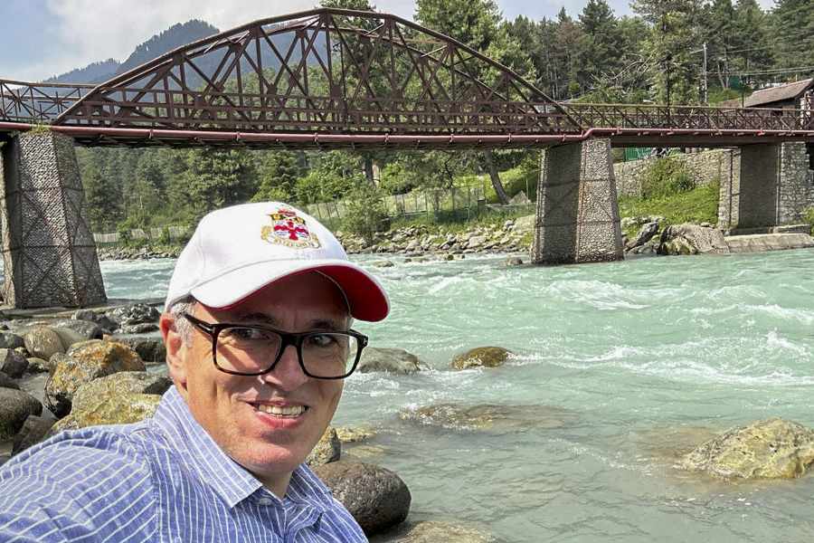 National Conference president Farooq Abdullah plays golf in Pahalgam on Tuesday.