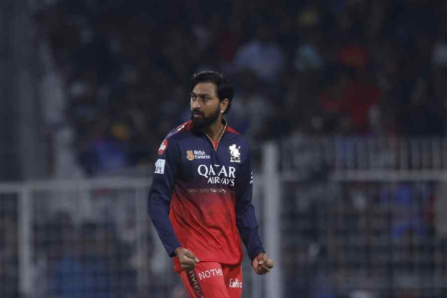 Krunal Pandya of Royal Challengers Bengaluru celebrates the wicket of Venkatesh Iyer Kolkata Knight Riders