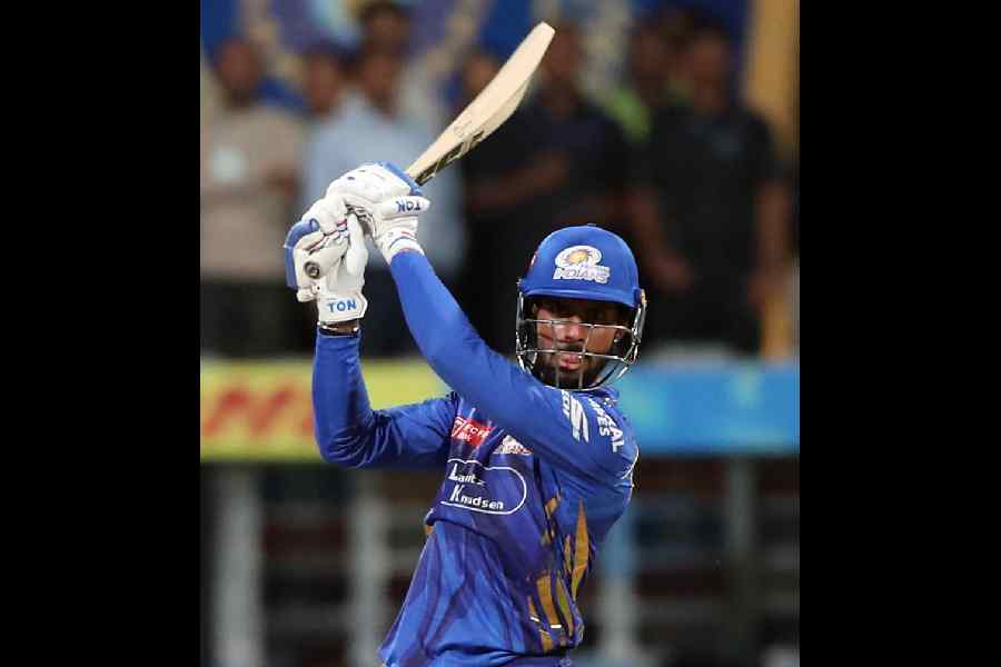 Mumbai Indians' Tilak Varma in action