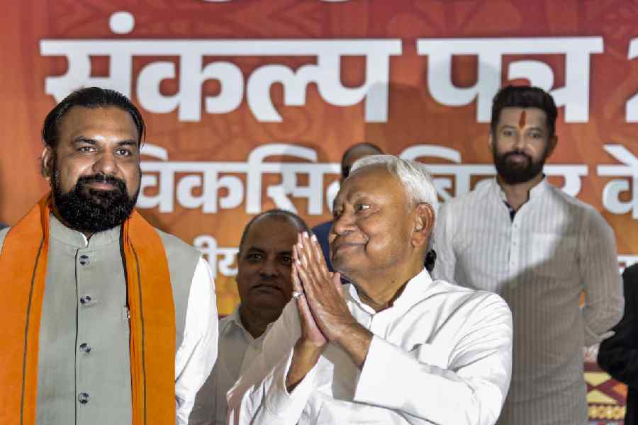 Nitish Kumar with the BJP’s Samrat Chaudhary (extreme left), JDU’s Sanjay Jha and LJP’s Chirag Paswan during the release of the NDA’s manifesto in Patna on Friday.