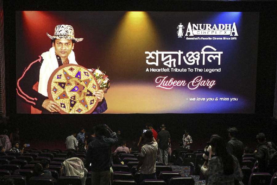Fans watch Zubeen Garg’s final film inside a movie theatre in Guwahati, Assam, on Friday. 