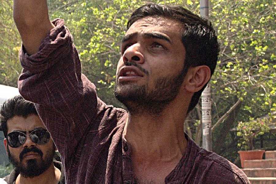 A photograph of a tribe from Singhbhum from 1897