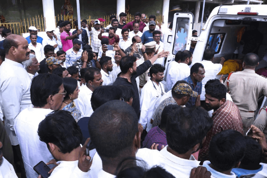 Andhra Pradesh minister K. Atchannaidu visits the spot after a stampede occurred at Venkateswara temple, at Kasibugga in Srikakulam district, Saturday, Nov. 1, 2025. At least nine people were killed and several others suffered injuries in the incident.