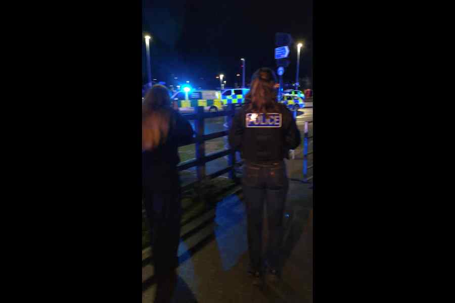 Police operate near the scene after a series of stabbings on a train near Cambridge, Britain, November 1, 2025, in this screengrab from video obtained from social media.