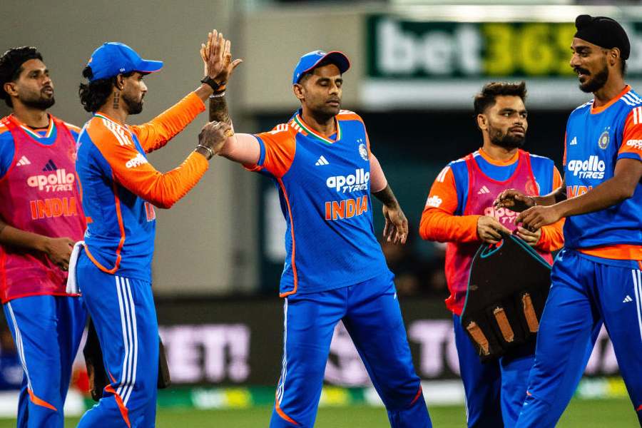 India players celebrate a wicket during the T20 cricket international between India and Australia in Hobart, Sunday, Nov. 2, 2025.