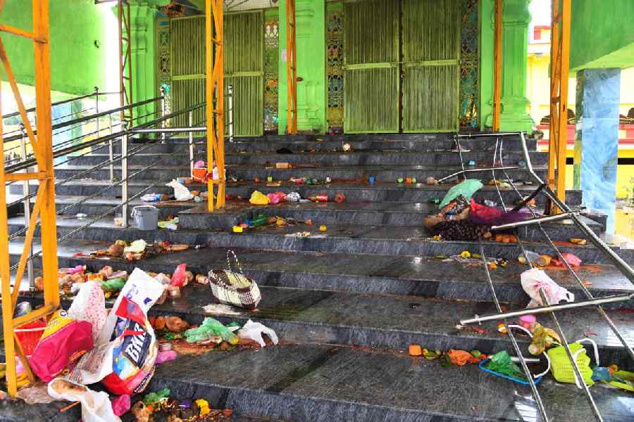 Personal belongings, food and other items lie on the stairs of Ventakeswara Swamy Temple after a stampede, at Kasibugga, in Srikakulam district, Andhra Pradesh, Saturday, Nov. 1, 2025.