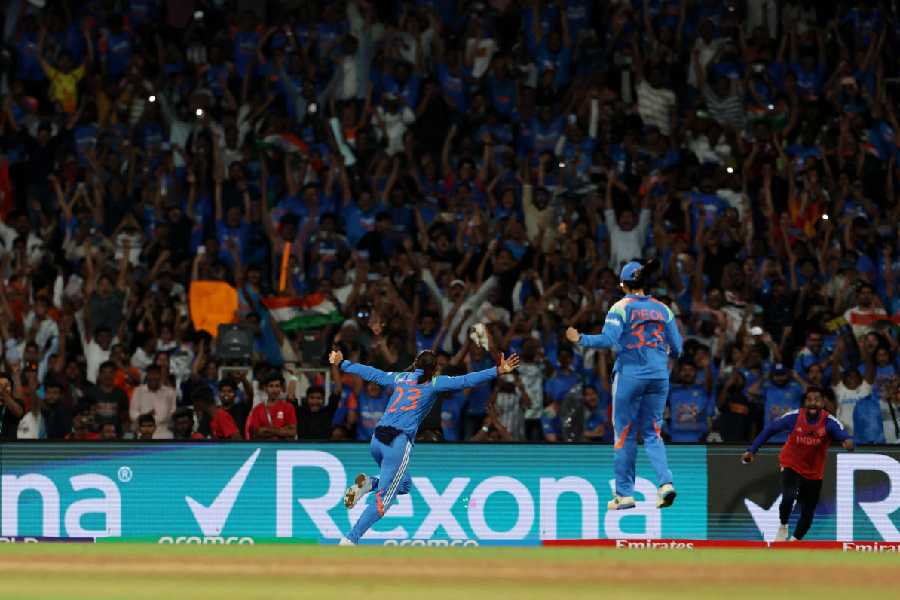 India's Harmanpreet Kaur celebrates after winning the ICC Women's World Cup