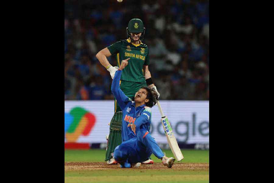 Player of the Match Shafali Verma celebrates after taking Sune Luus’s wicket in the Women’s World Cup final, as South Africa skipper Laura Wolvaardt looks on, at the DY Patil Stadium on Sunday