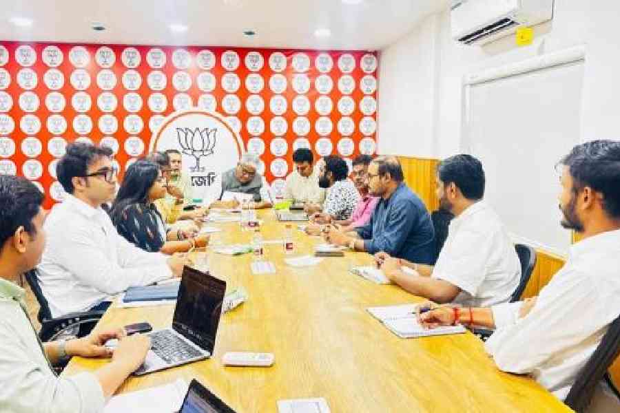 Senior BJP leaders, including Bengal election in-charge Bhupender Yadav (in a grey vest), in an organisational meeting on Friday at the party's Salt Lake office in Calcutta