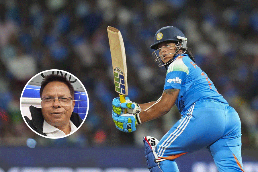 India's Richa Ghosh plays a shot during the ICC Women's World Cup final ODI cricket match between India Women and South Africa Women, at the DY Patil Stadium, in Navi Mumbai, Sunday, Nov. 2, 2025.