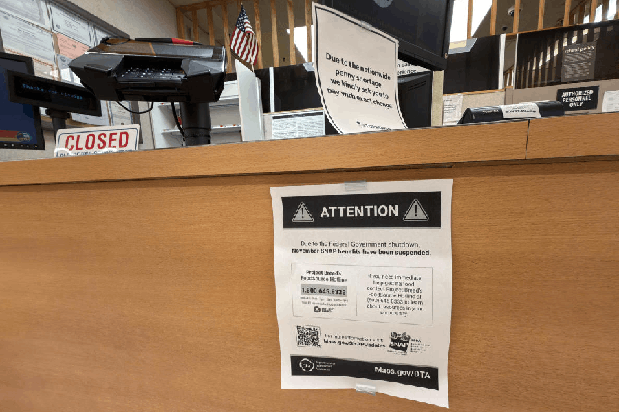 A sign hangs at a customer service area, as the U.S. President Donald Trump administration said it plans on Monday to partially fund food aid for millions of Americans after two judges ruled it must use contingency funds to pay for the benefits in November during the government shutdown, at a grocery story in Long Beach, New York, U.S., November 3, 2025.
